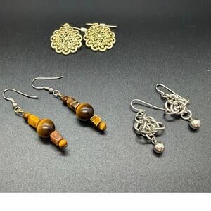 Earrings are featured in various artisan jewelry collections